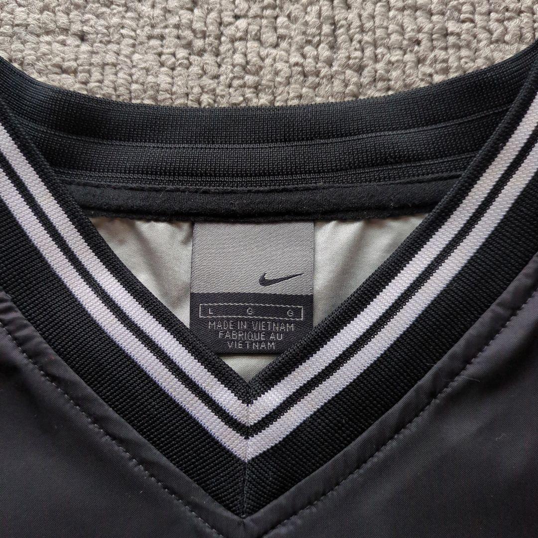 美品ナイキナイロンジャケットピステワンポイント刺繍バックプリント黒L
