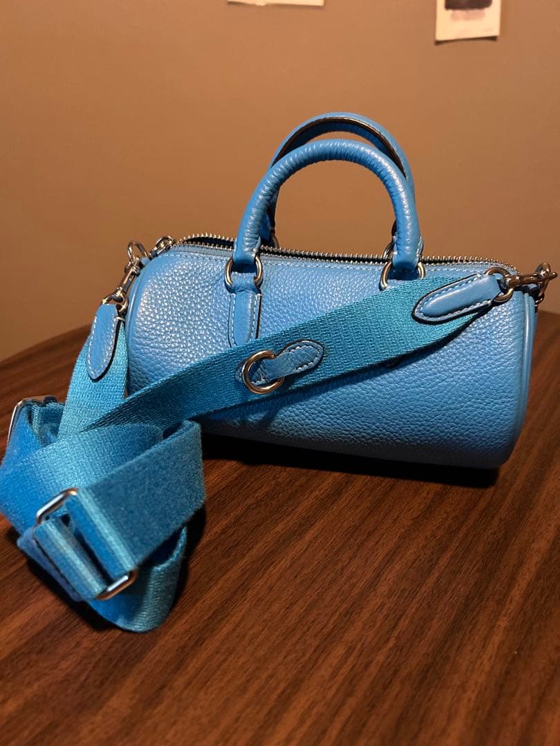 COACH タッセル付きショルダーバッグ