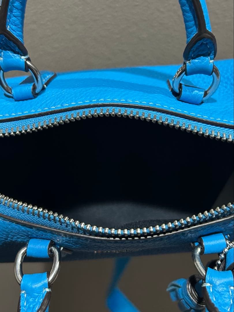 COACH タッセル付きショルダーバッグ