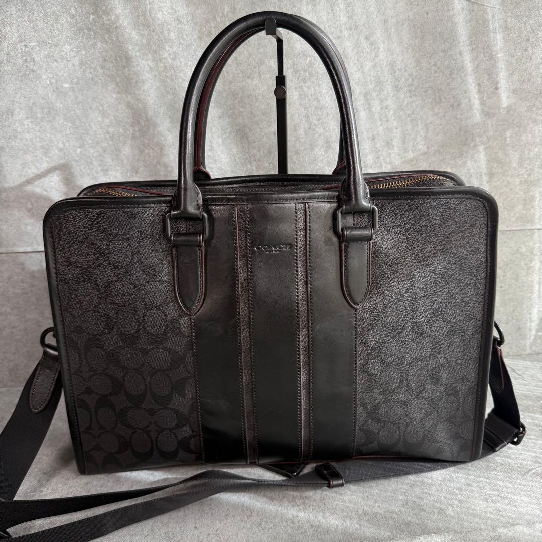 良品 コーチ ビジネスバッグ A4収納可 シグネチャー F23212