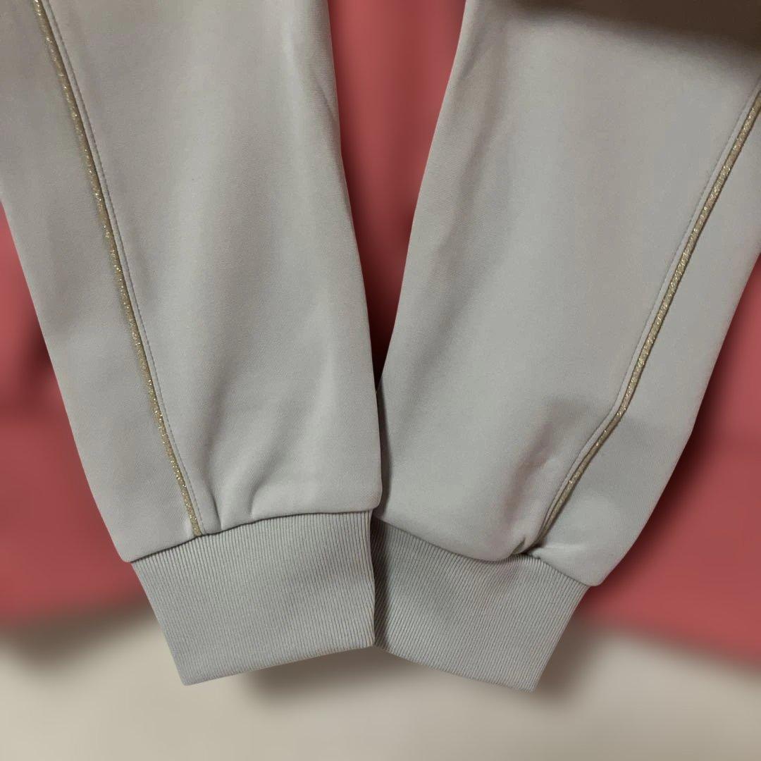 ELLESSE ジャージセットアップ ピンク パンツバックロゴ刺繍 レディースＭ