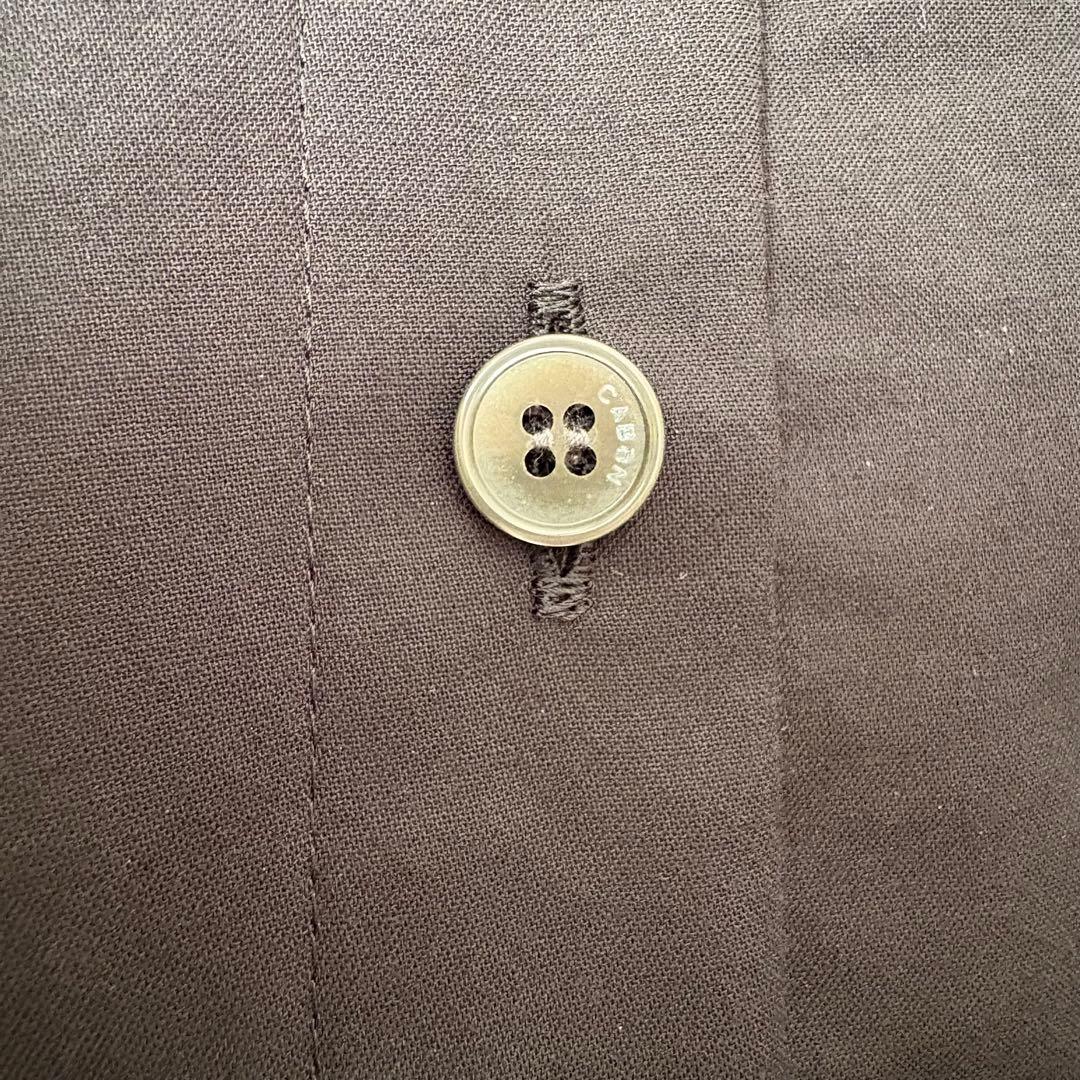 CABaNタイプライターダブルクロス アシンメトリックフリルロングスリーブシャツ