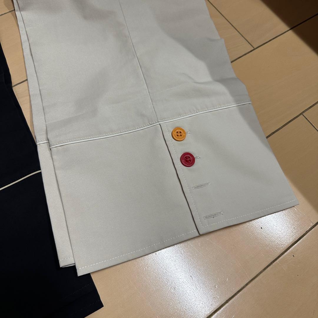 マンシングウェア レディースゴルフパンツ ブラック＆オフホワイト 2点セット