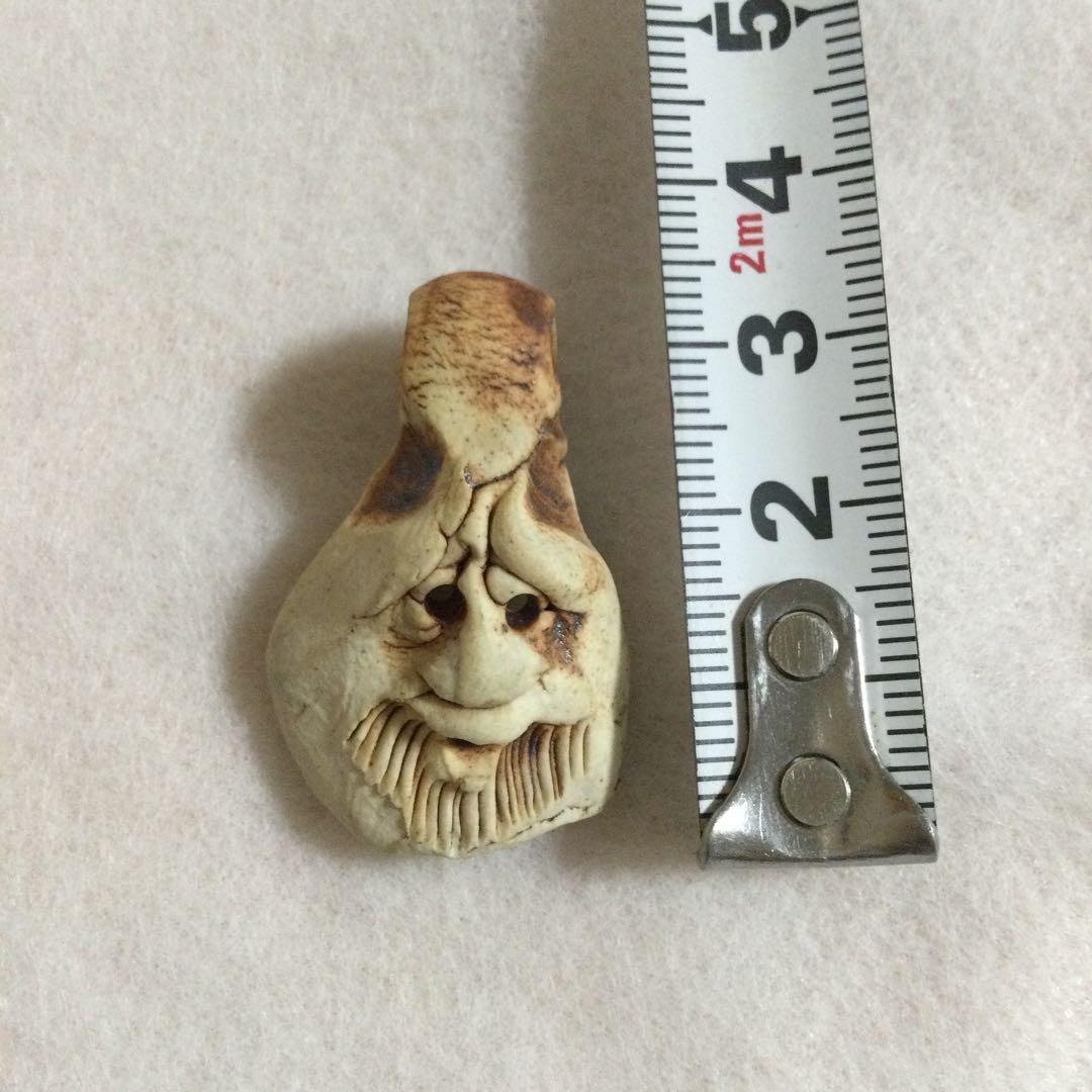 呪物　御守り　顔　ペンダントヘッド