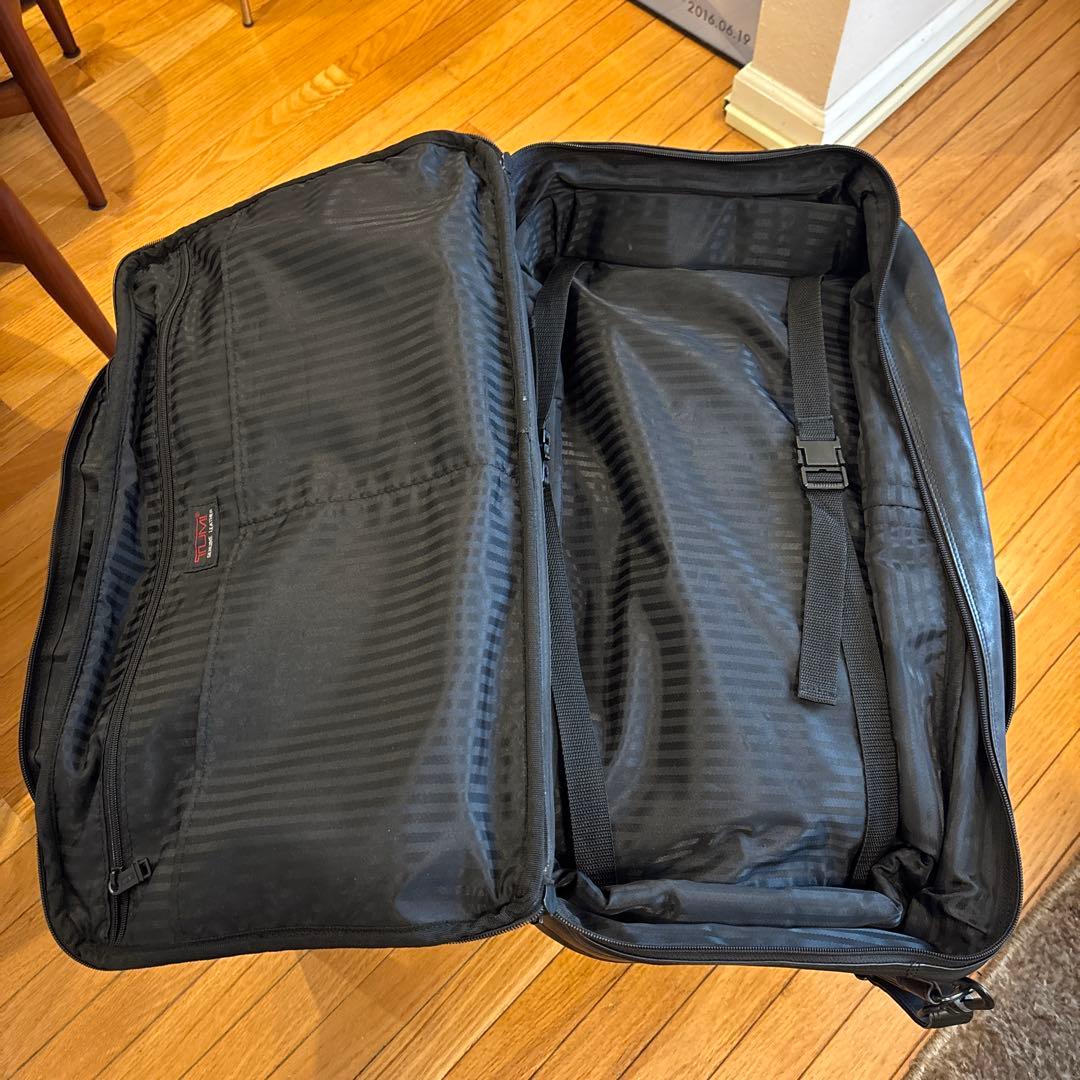 TUMI 革製旅行バッグ