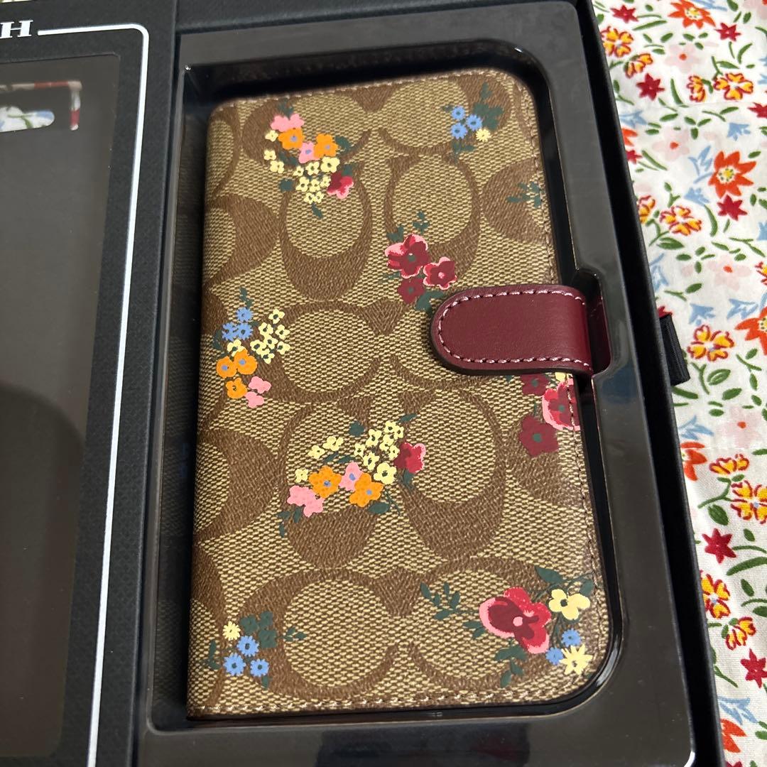 COACH 花柄手帳型ケース iPhone 6.1\" Pro (2022)
