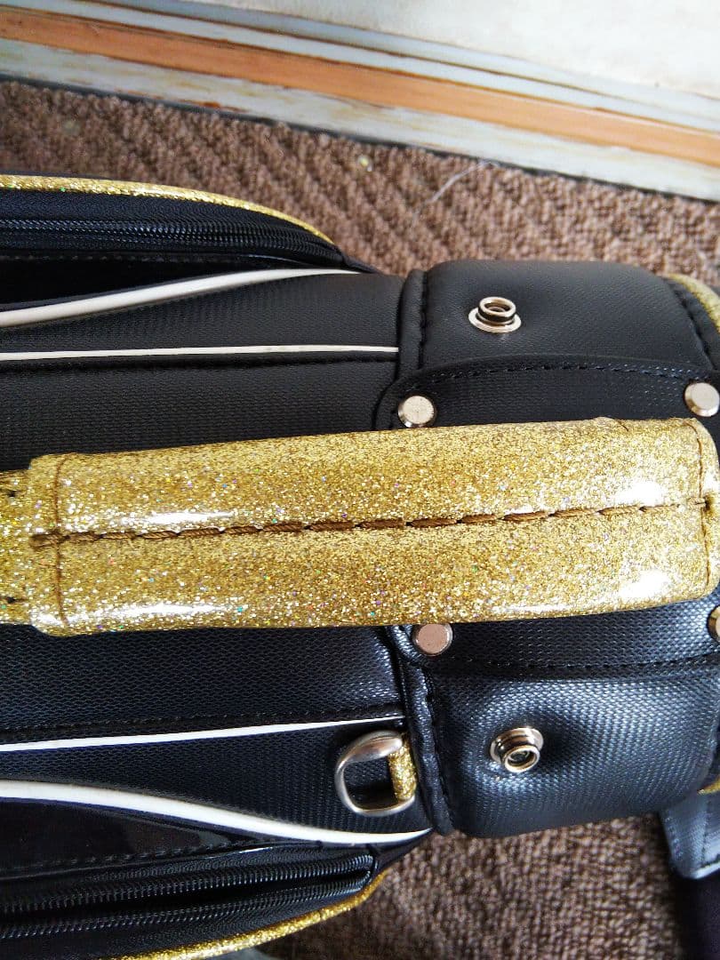 ルコック　レディース 黒と金文字のゴルフバック、黒