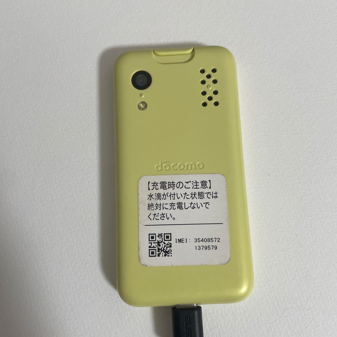 docomo イエロー 携帯電話本体