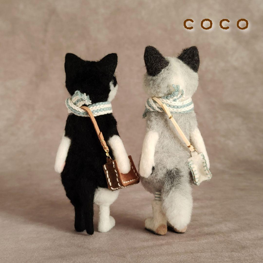 ショルダーバックを下げたプラチナフォックスさん