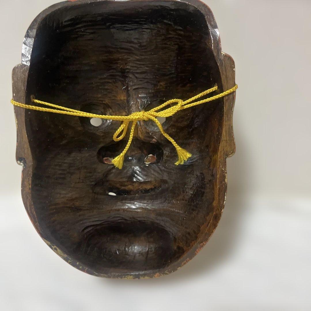 金色の木製能面