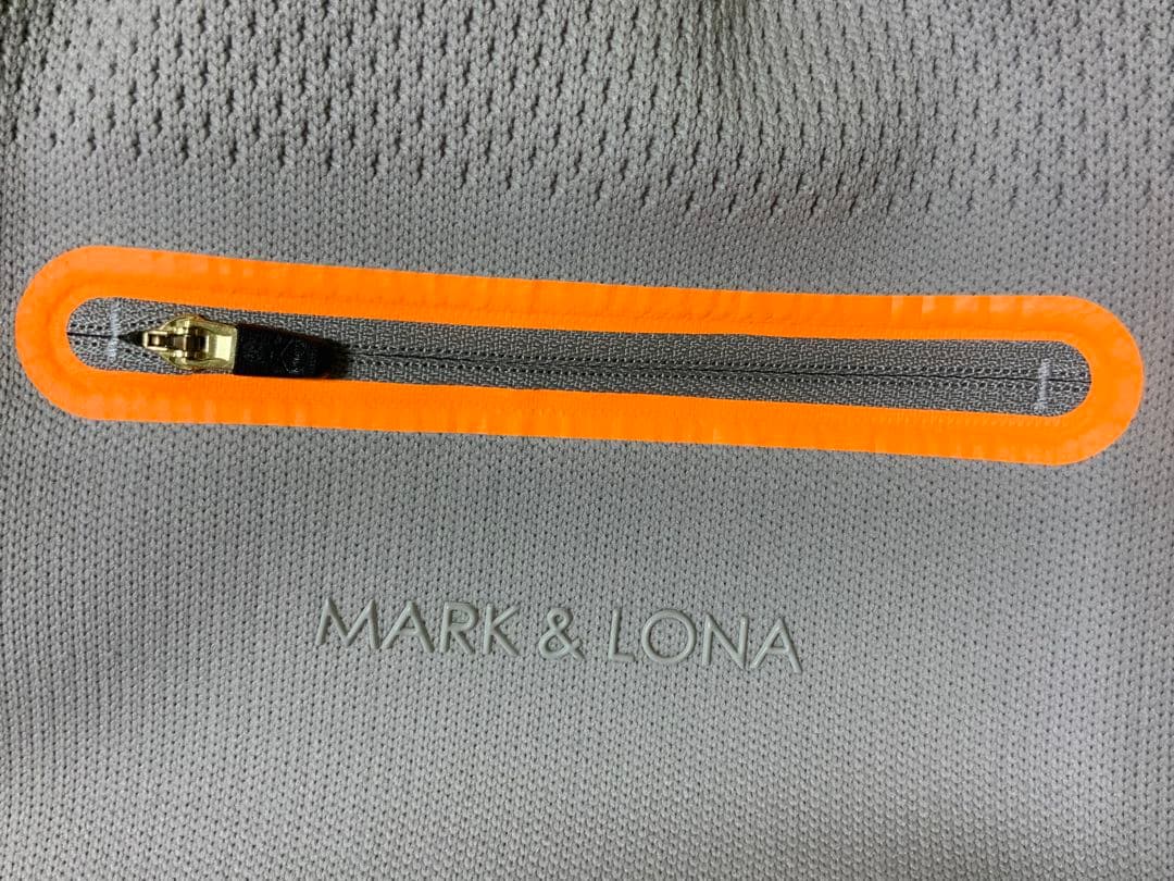 マークアンドロナレディースパンツ オレンジジッパー