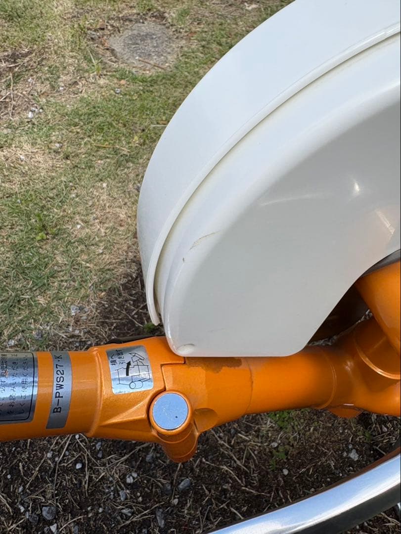 オレンジ色折りたたみ自転車（ナショナル）