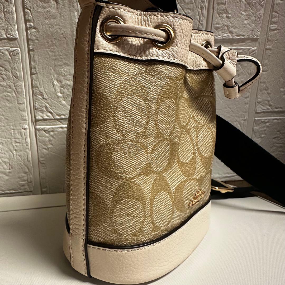 n*o様 【美品】コーチシグネチャー コーテッド キャンバス、リファインド ペブ