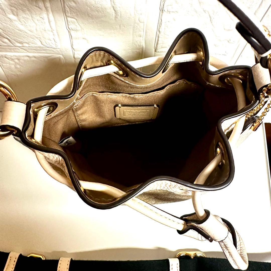 n*o様 【美品】コーチシグネチャー コーテッド キャンバス、リファインド ペブ