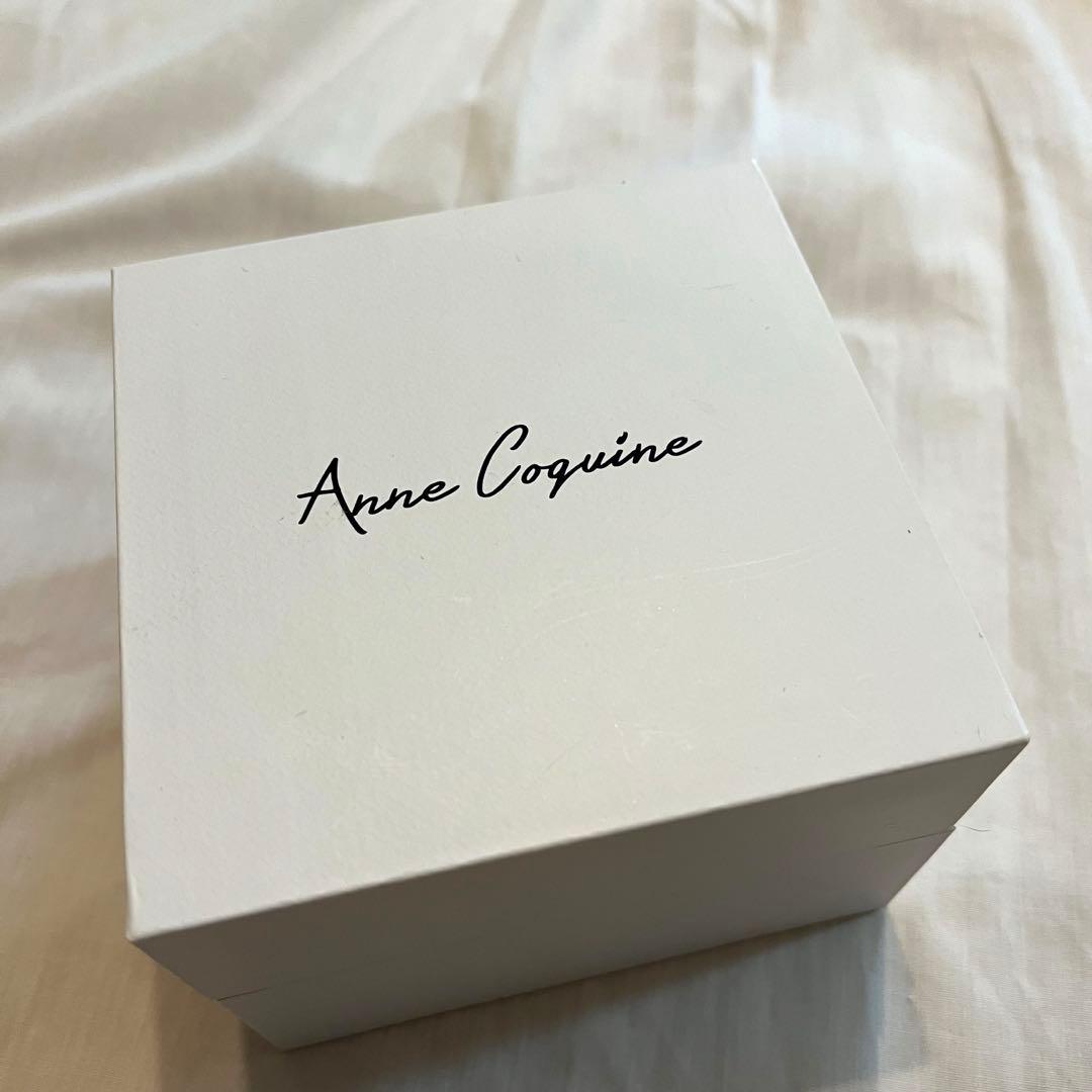 Anne Coquine アンコキーヌ クリスタルストーン腕時計（ホワイト）