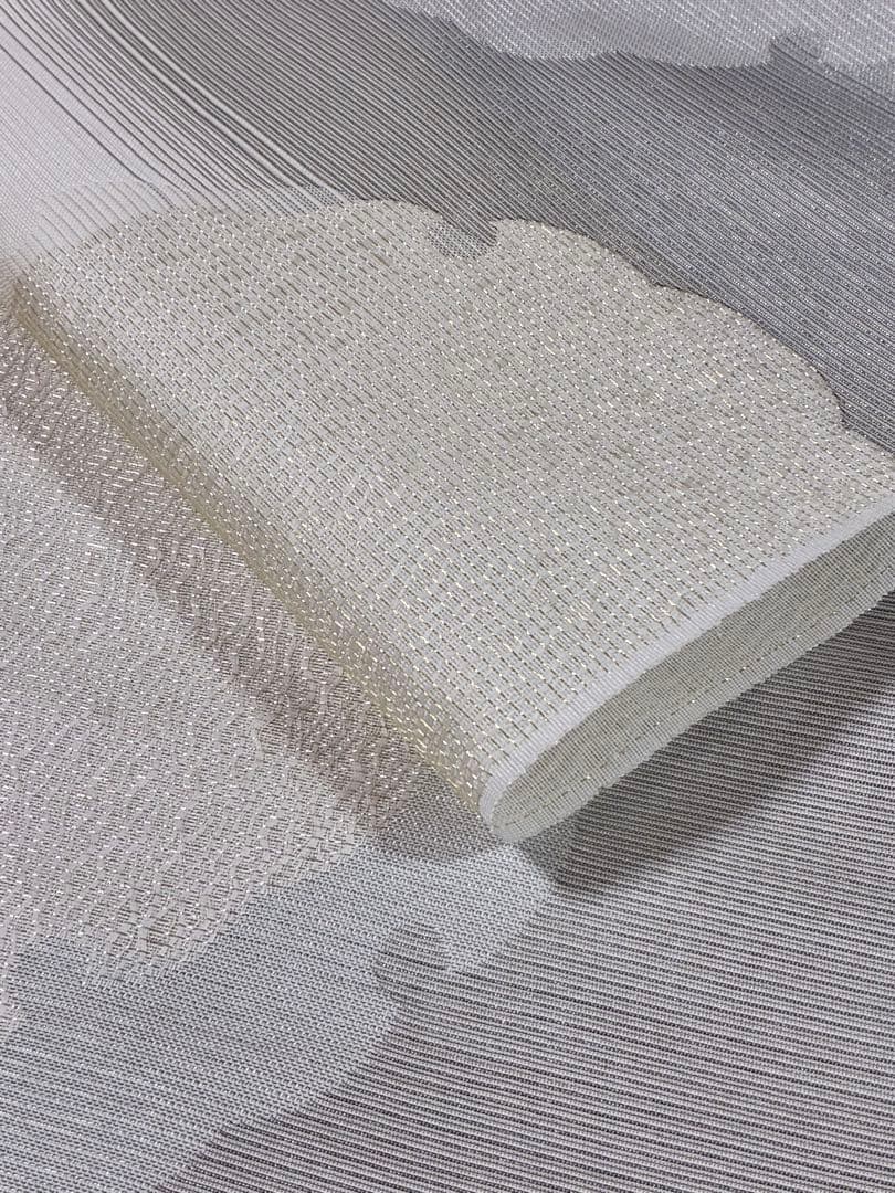 粋でモダンな装い！西陣全通名古屋帯 綿芯本仕立ガード加工済　雪輪文 簡易包装