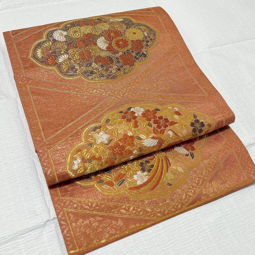 梅垣織物　袋帯　西陣織　七宝菱蒔絵文　正絹　金糸　オレンジゴールド系　逸品