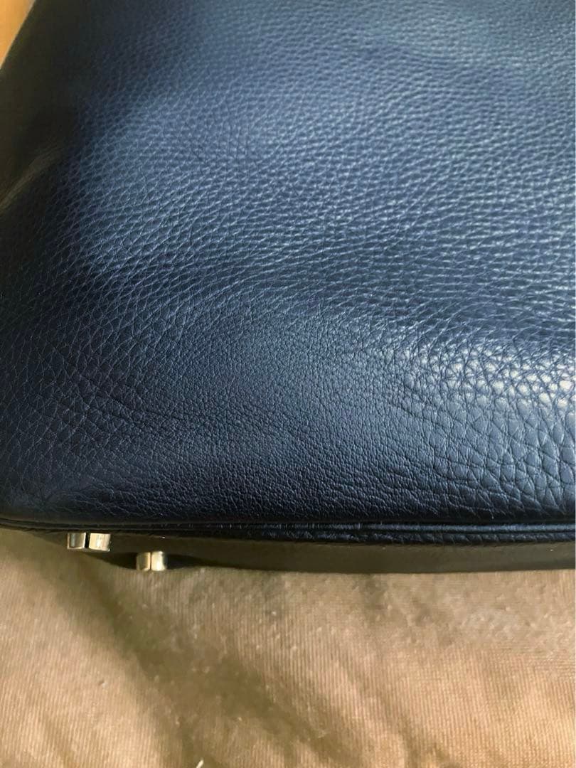 Cisei 999 LD シュリンクレザー ラウンドジップ ブリーフバッグ