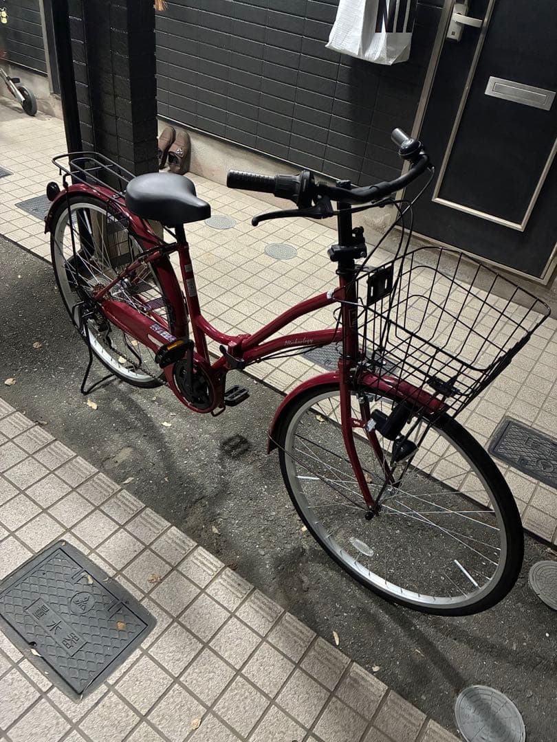 赤い折りたたみ自転車 前面バスケット付き