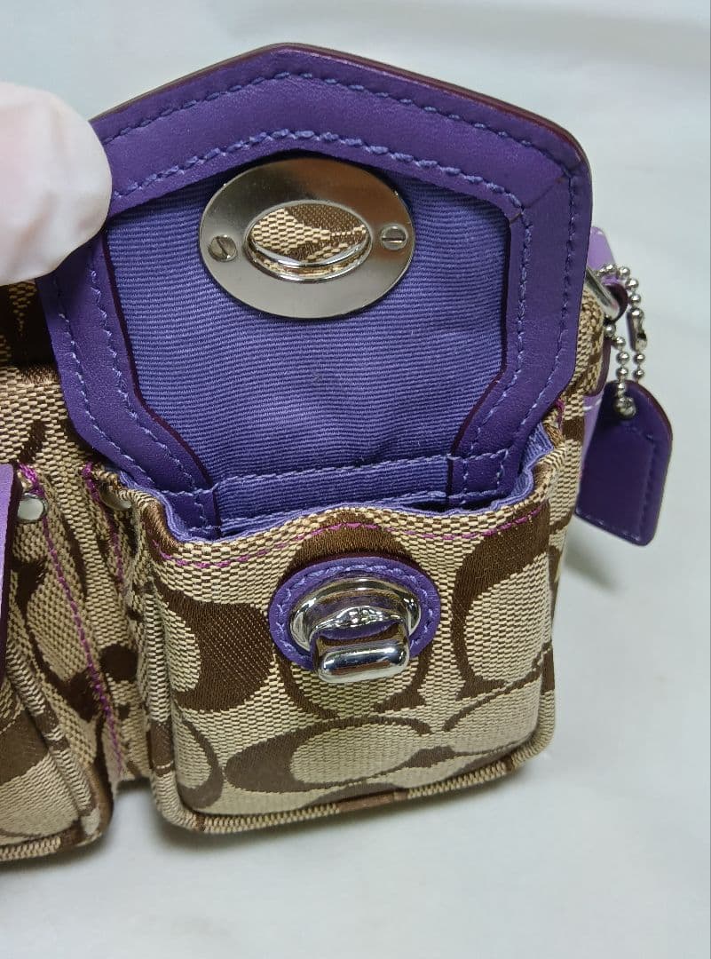 COACH(コーチ) ポーチ　ハンドバッグ　シグネチャー柄　ダブルターンロック