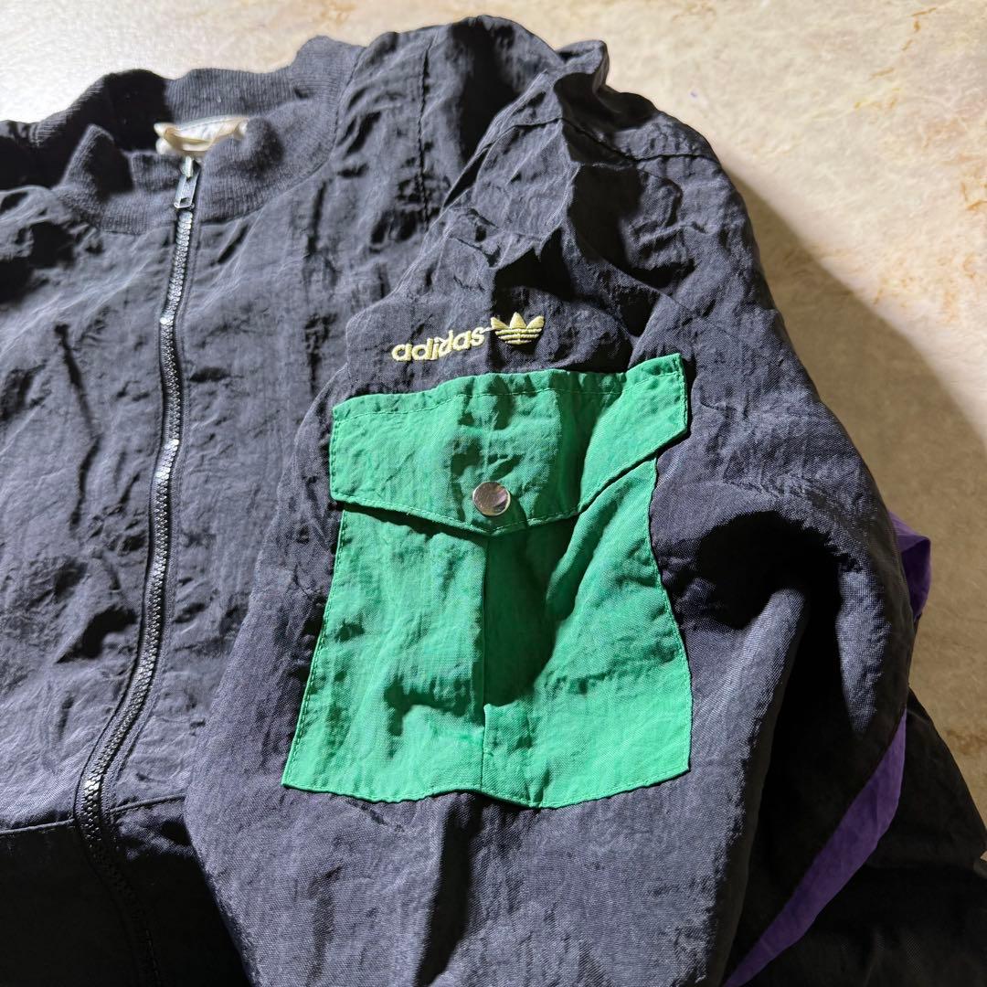 90s adidasナイロンジャケットL万国旗銀タグ CBOYクレイジーパターン