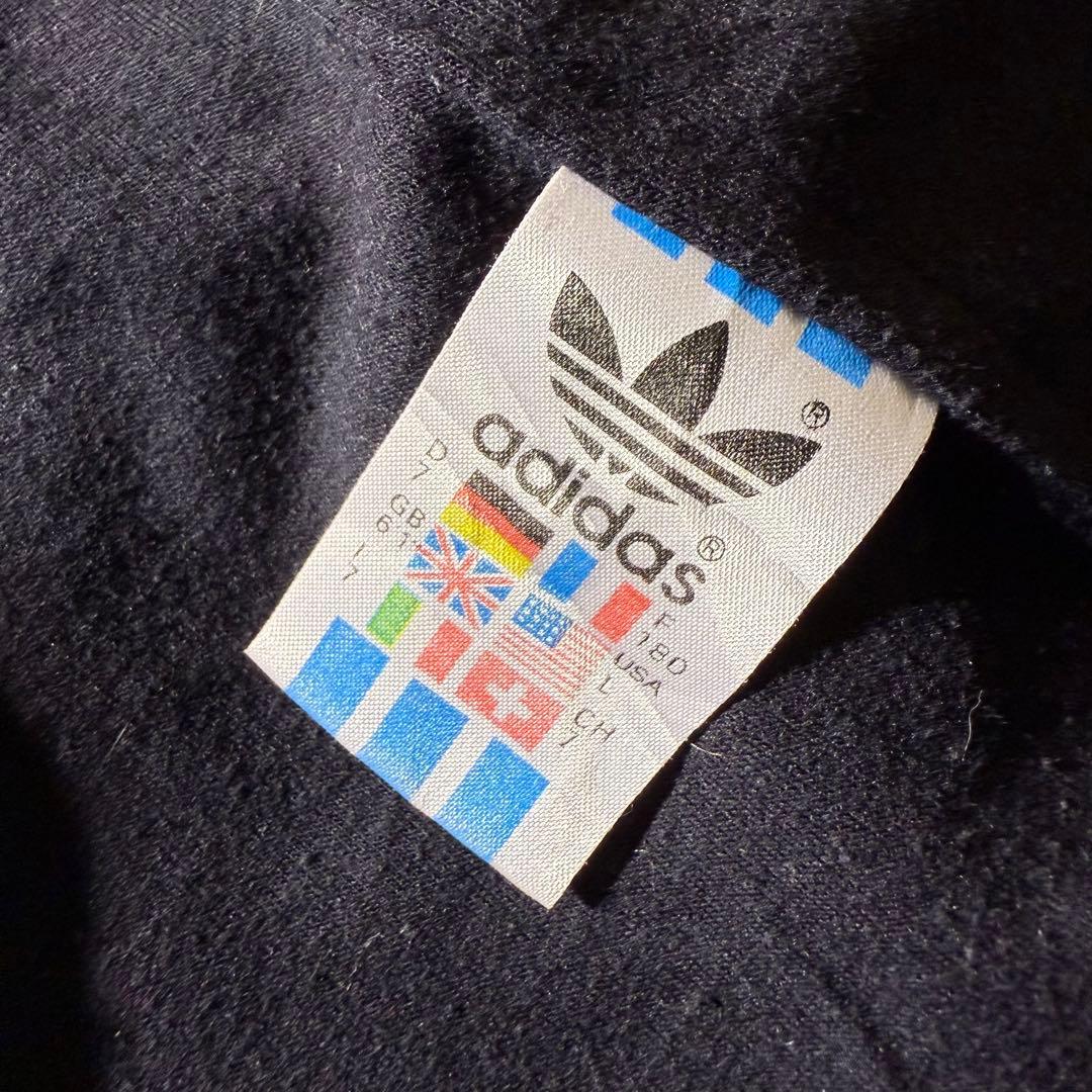 90s adidasナイロンジャケットL万国旗銀タグ CBOYクレイジーパターン