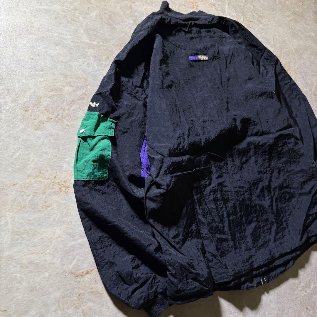 90s adidasナイロンジャケットL万国旗銀タグ CBOYクレイジーパターン