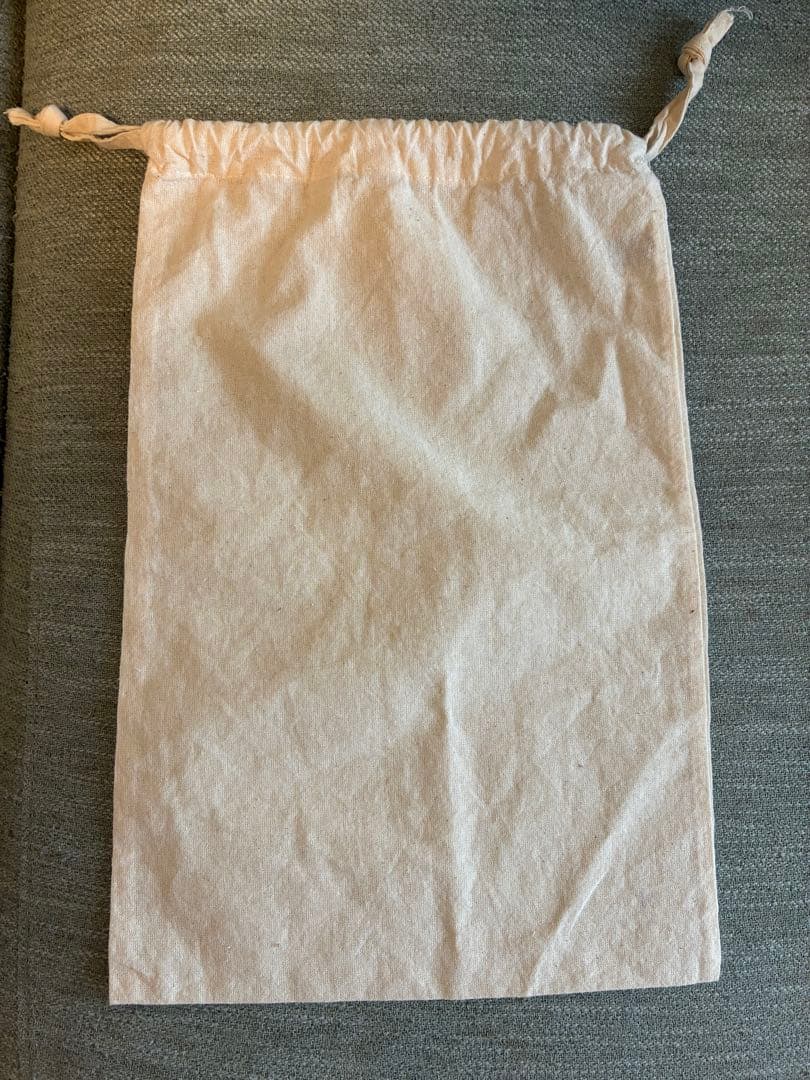 リネンのエプロンワンピース KURASHI&Trips PUBLISHING