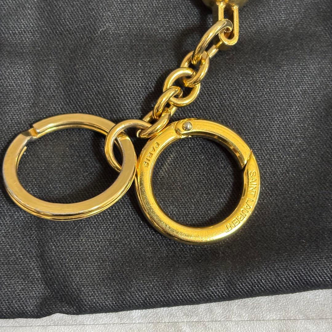 H154 良品✨サンローランパリ　キーホルダー　メタルホイッスル　笛　男女兼用