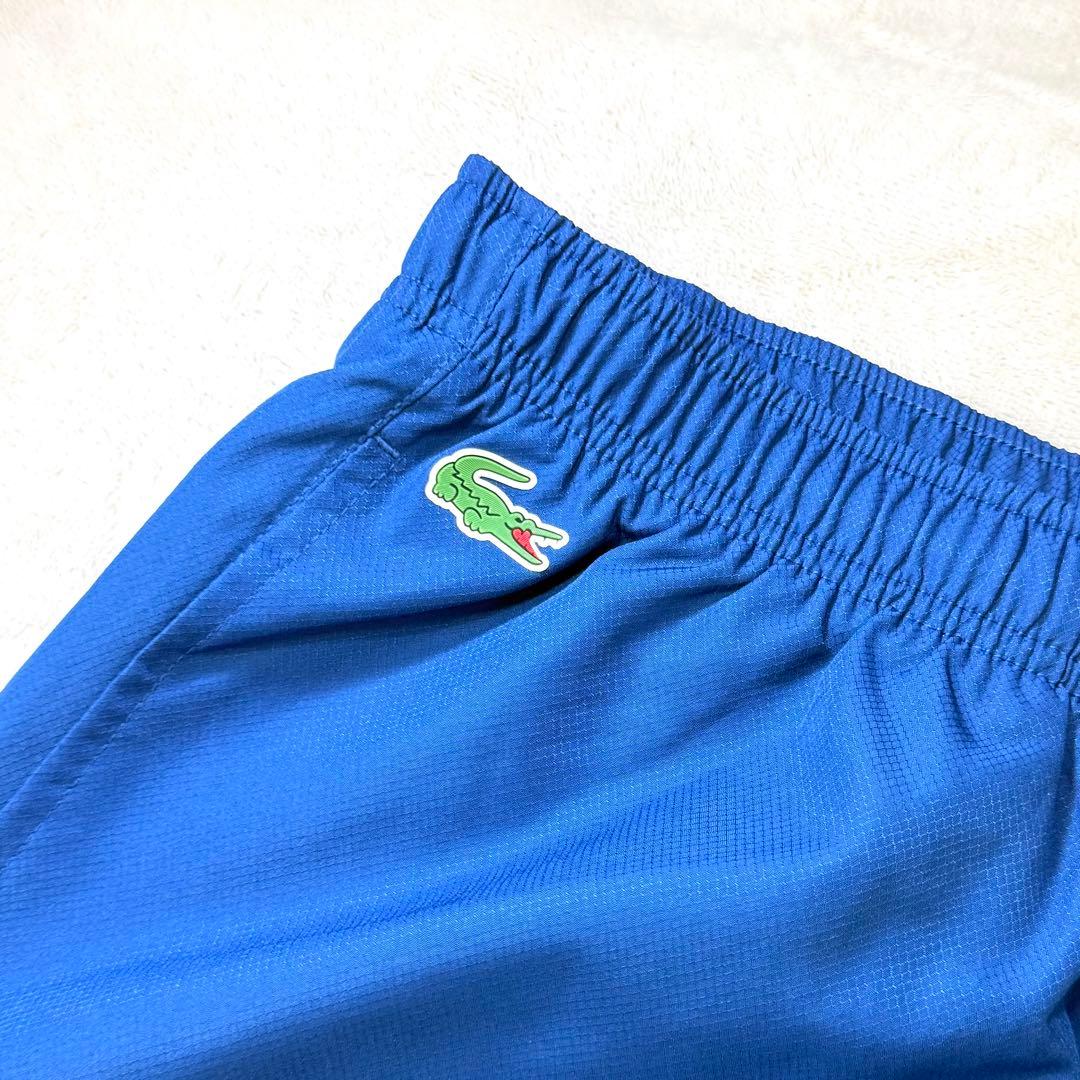 未使用‼️LACOSTE 幾何学模様 フードジャケットパンツ 上下セットアップ L