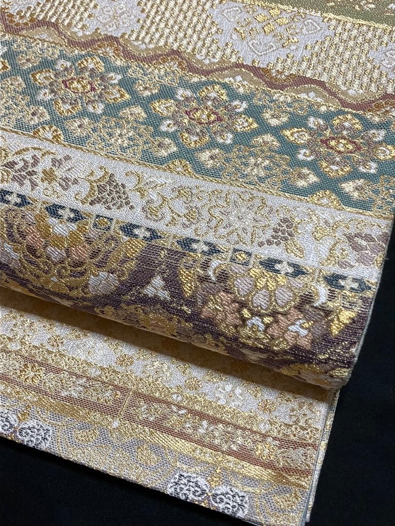 ツーシーズンリバーシブル袋帯 全通柄 正絹 正倉院百彩文 未使用に近いイ6524