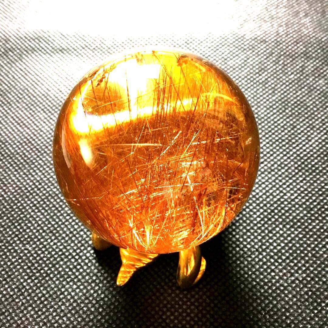 ゴールドルチルクォーツ置物　丸玉　ブラジル産　直経約4.83cm 重さ約160g