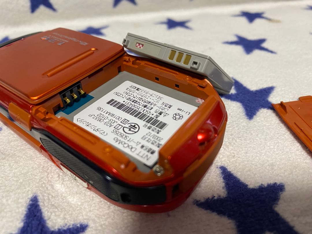 SO505iS オレンジ 回転式 携帯電話