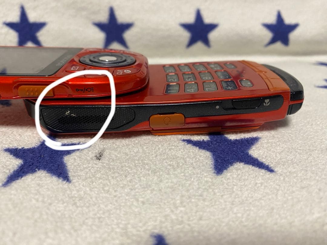 SO505iS オレンジ 回転式 携帯電話