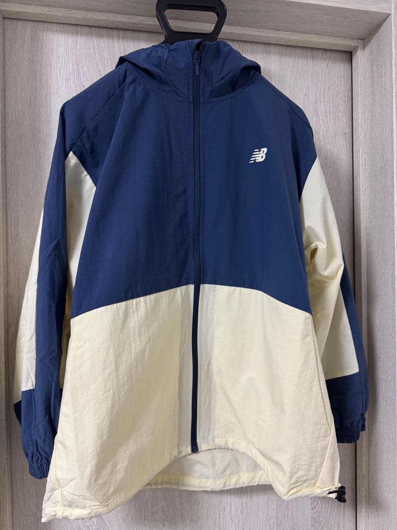 new balance タスランナイロンウーブンフーデッドジャケット XL