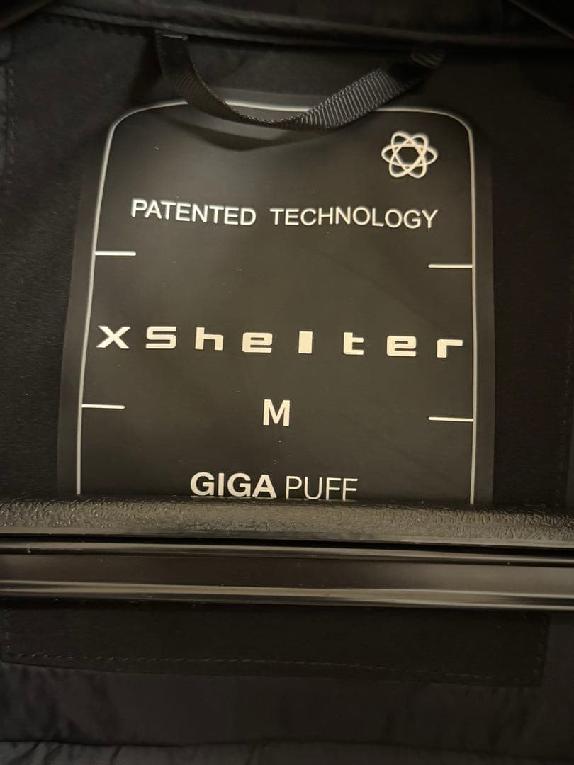 【新品未使用】エックスシェルター　断熱αプレミアムギガパフダウンコート