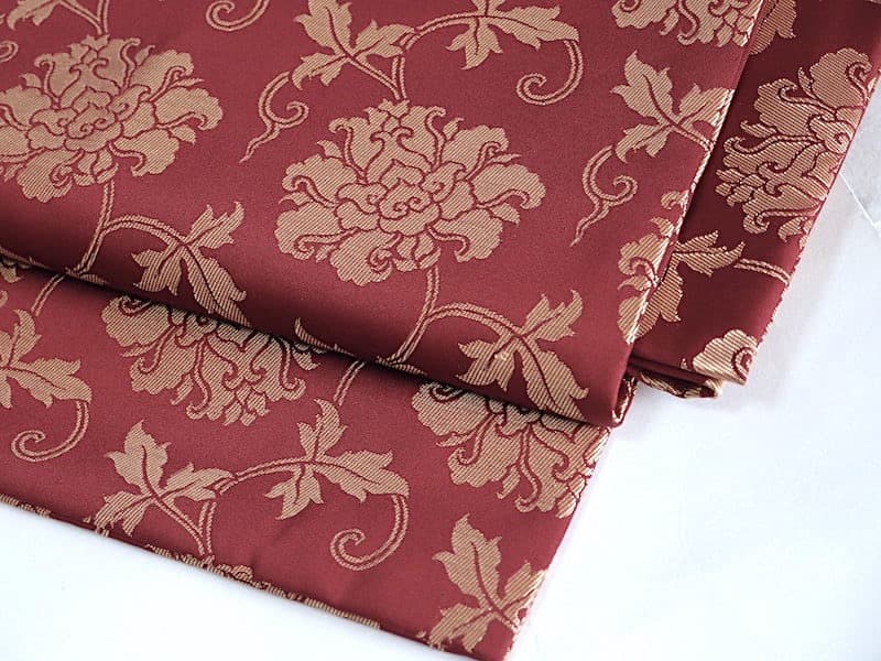 織りの九寸名古屋帯（牡丹唐草文）正絹美品