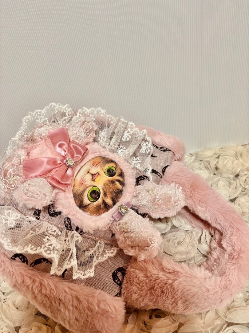 お取り置きです。コヤンイサムチョン　ピンクファのリボンゴブランころりんバッグ