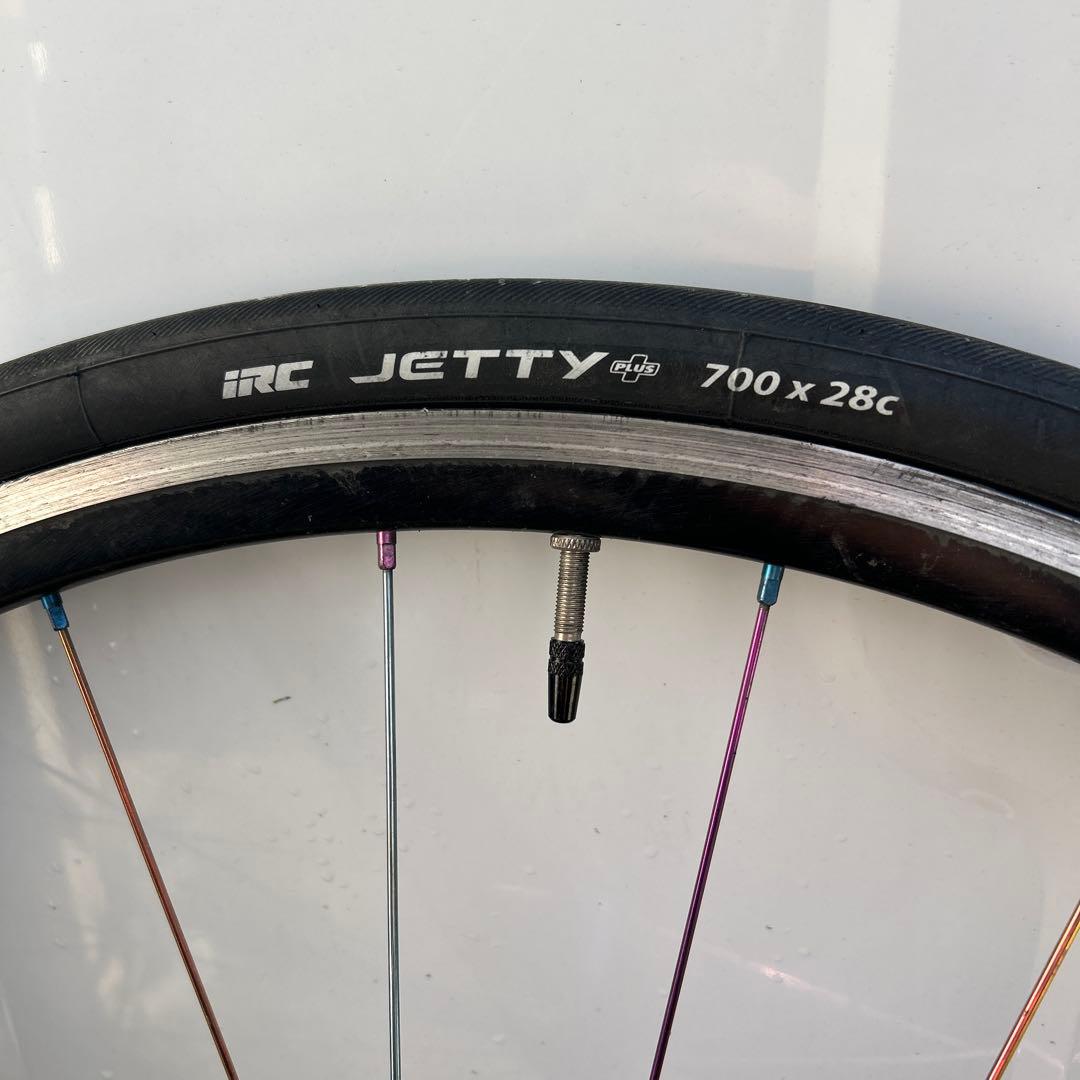 手組みホイールレインボースポーク前輪撤去品