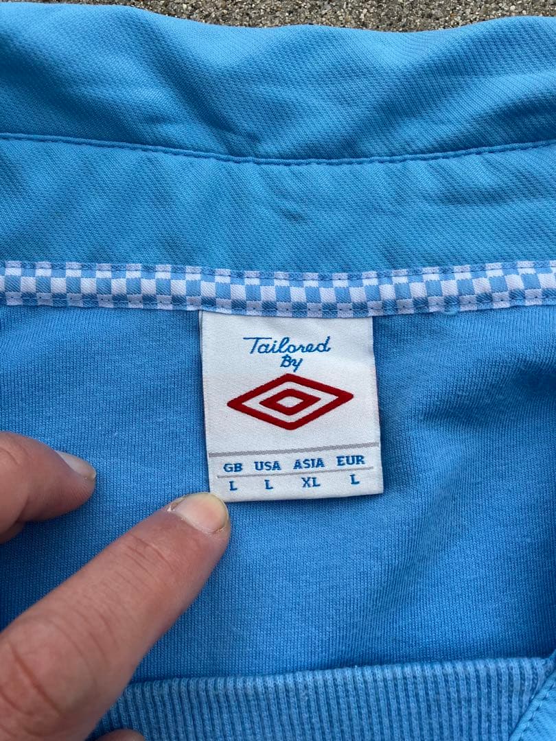 【バックプリント付】UMBRO×マンチェスターシティ/ピステ/ドリルトップ/XL