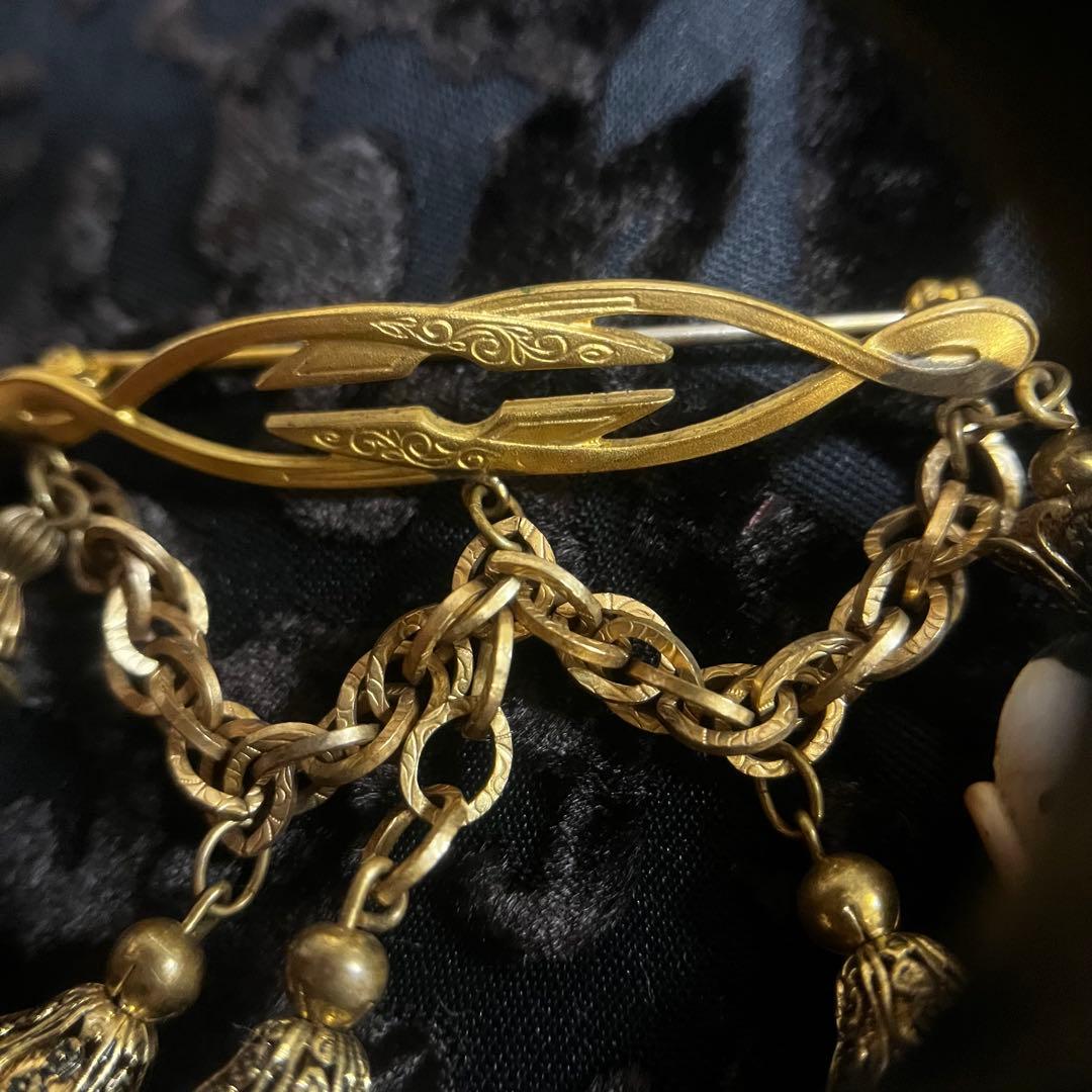 ヴィンテージ人形顔ブローチ