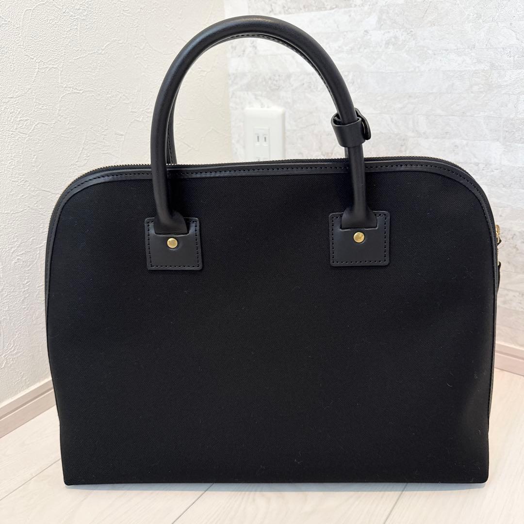 SLOW　TRADITIONAL コットンサージ/ラウンドブリーフケース