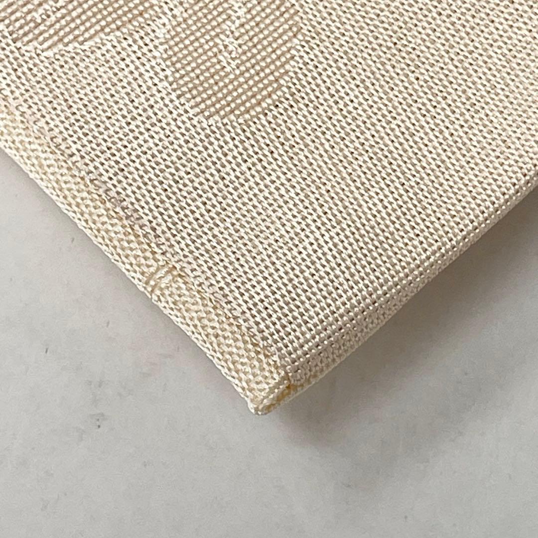 未使用［ 名古屋帯/ポリエステル ］東レシルック　生成り　菊　霞　芝草　洗える