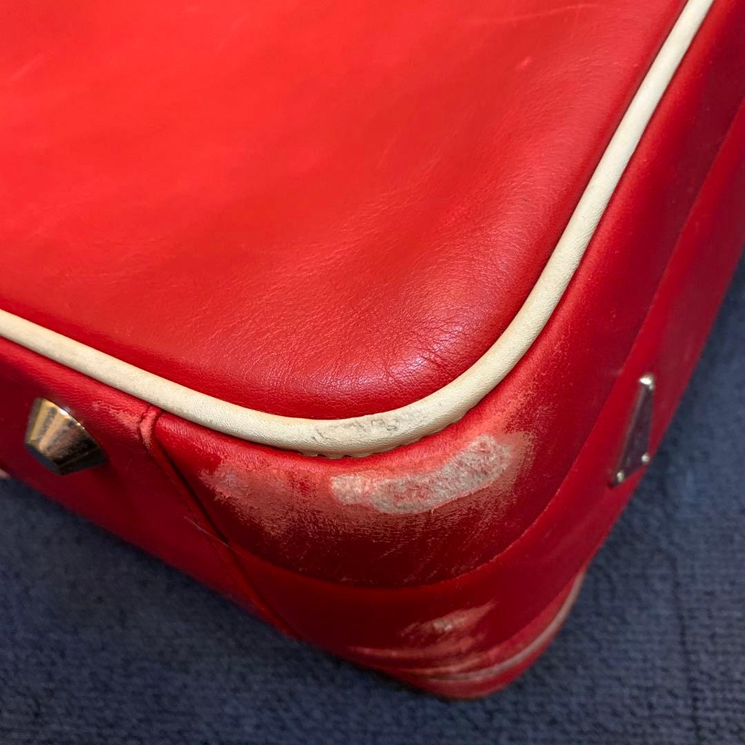 プラダ　PRADA トラベルバッグ　旅行用　スーツケース　赤　レッド　プレート