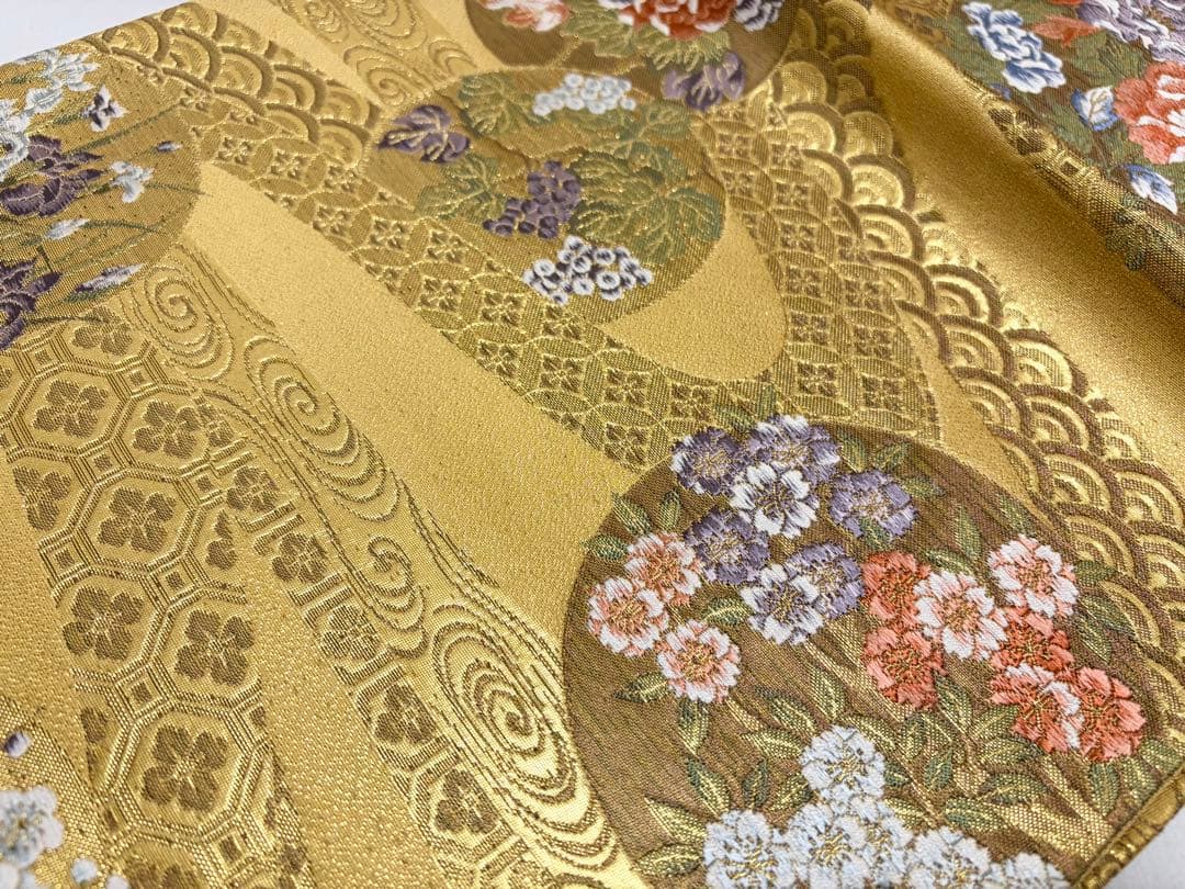 A5美品 花々 流水 葡萄 唐草唐花 華文 七宝 青海波 金糸 正絹 六通 袋帯