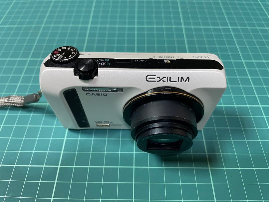 CASIO EXILIM EX-ZR100 ホワイト [電池挿入ふたロック不良]