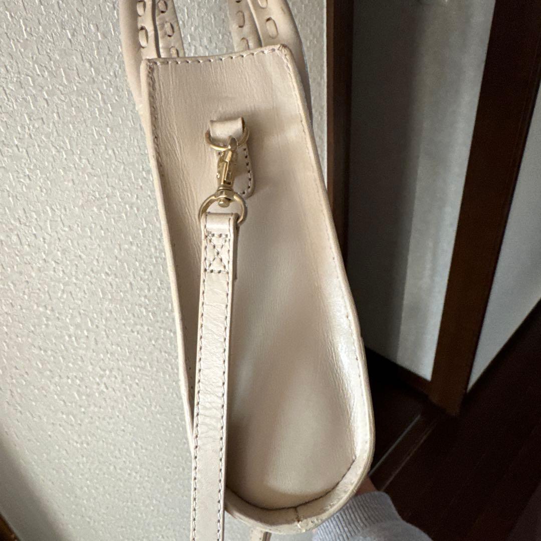 Carving Tribes エンボス花柄ショルダーバッグ