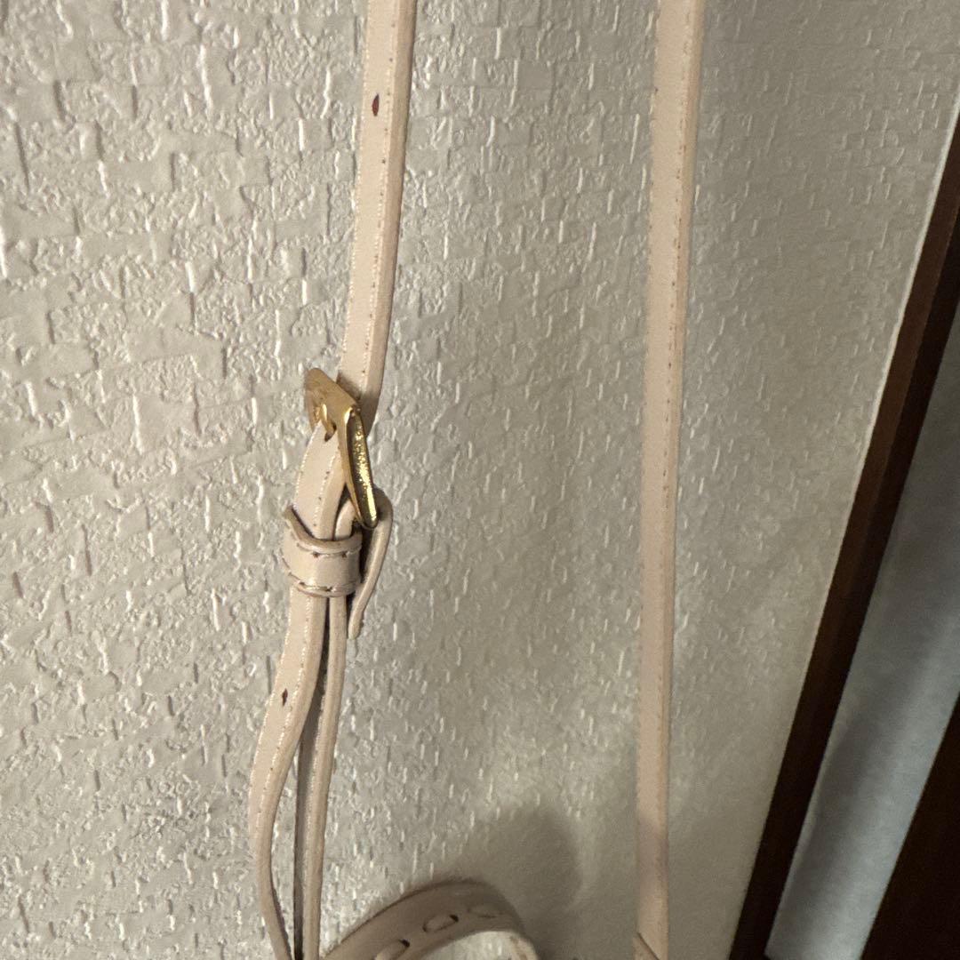 Carving Tribes エンボス花柄ショルダーバッグ