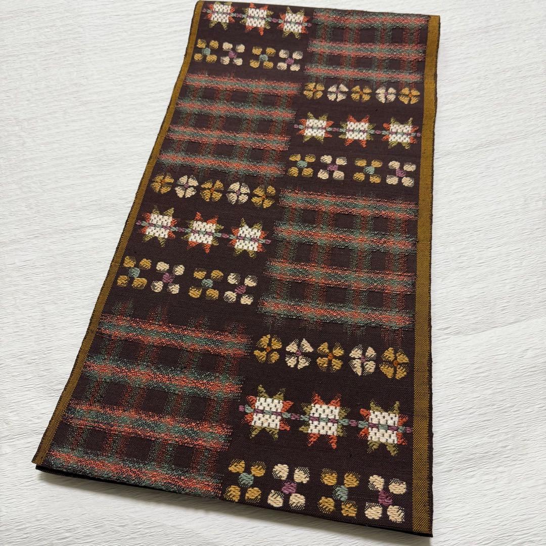 帯屋捨松 謹製 \"スウェーデン裂文\" 名古屋帯 正絹