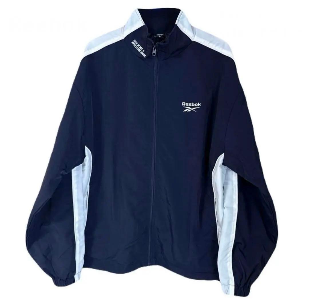 【Reebok】 別注スモールベクター刺繍裾ドロストナイロンジャケット